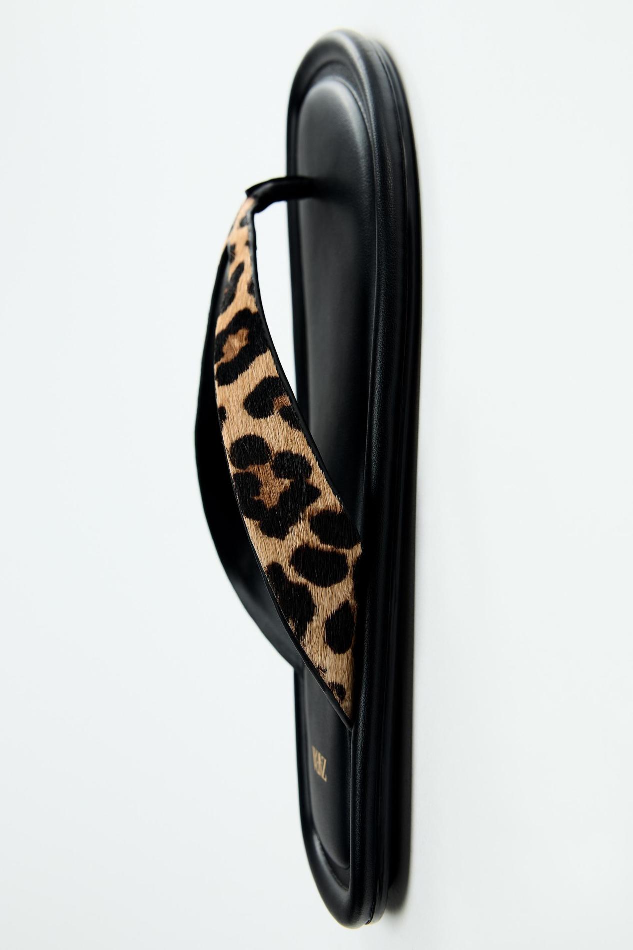 ANIMAL PRINT LEATHER FLAT SANDALS offers at S$ 75.9 in ZARA