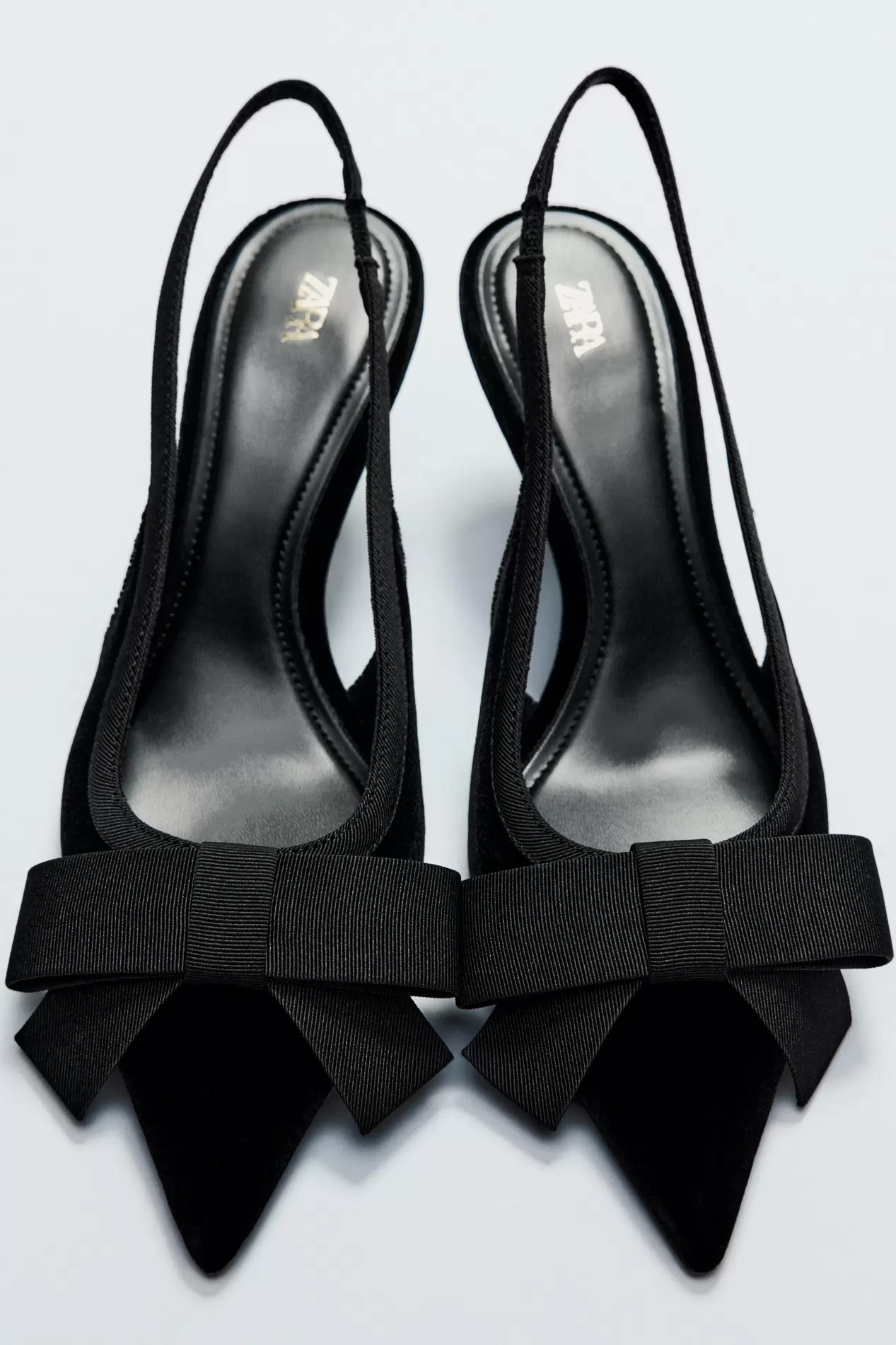 VELVET EFFECT SLINGBACKS WITH BOW DETAIL offers at S$ 89.9 in ZARA