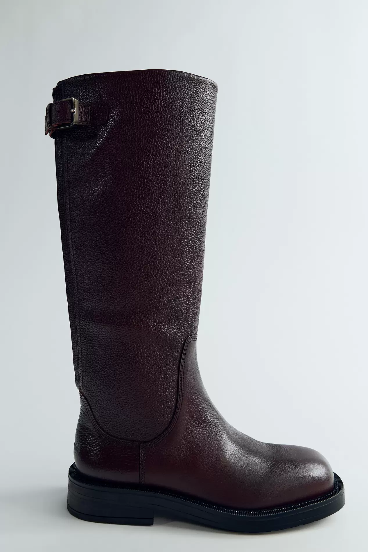 FLAT LEATHER BUCKLE ANKLE BOOTS offers at S$ 239 in ZARA