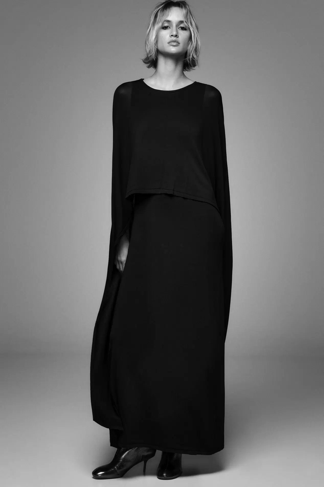 LONG KNIT CAPE DRESS offers at S$ 119 in ZARA