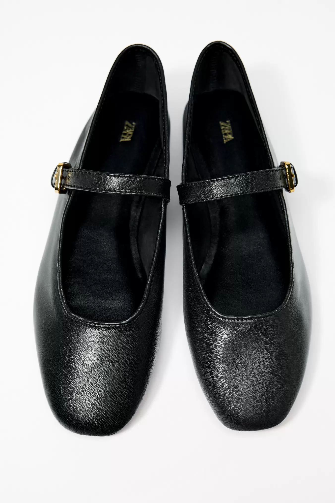 LEATHER BALLET FLATS offers at S$ 75.9 in ZARA