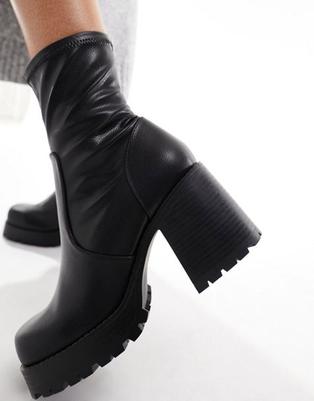 ASOS DESIGN Retreat mid-heeled sock boots in black offers at S$ 24 in asos