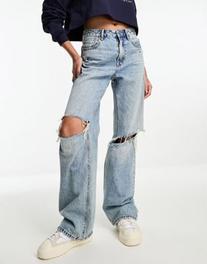Stradivarius wide leg dad jean with rips in medium blue offers at S$ 23.99 in asos