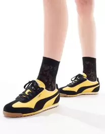 Puma Arizona trainers in yellow & black offers at S$ 75 in asos