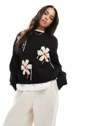 ASOS DESIGN knitted jumper with tassel floral in black offers at S$ 28 in asos