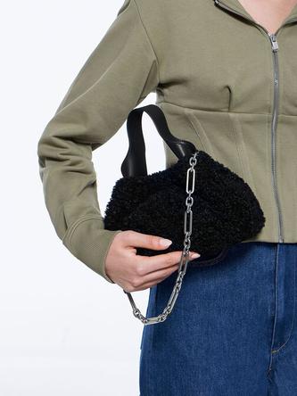Ally Furry Slouchy Chain-Handle Bag               - noir offers at S$ 48.9 in Charles & Keith
