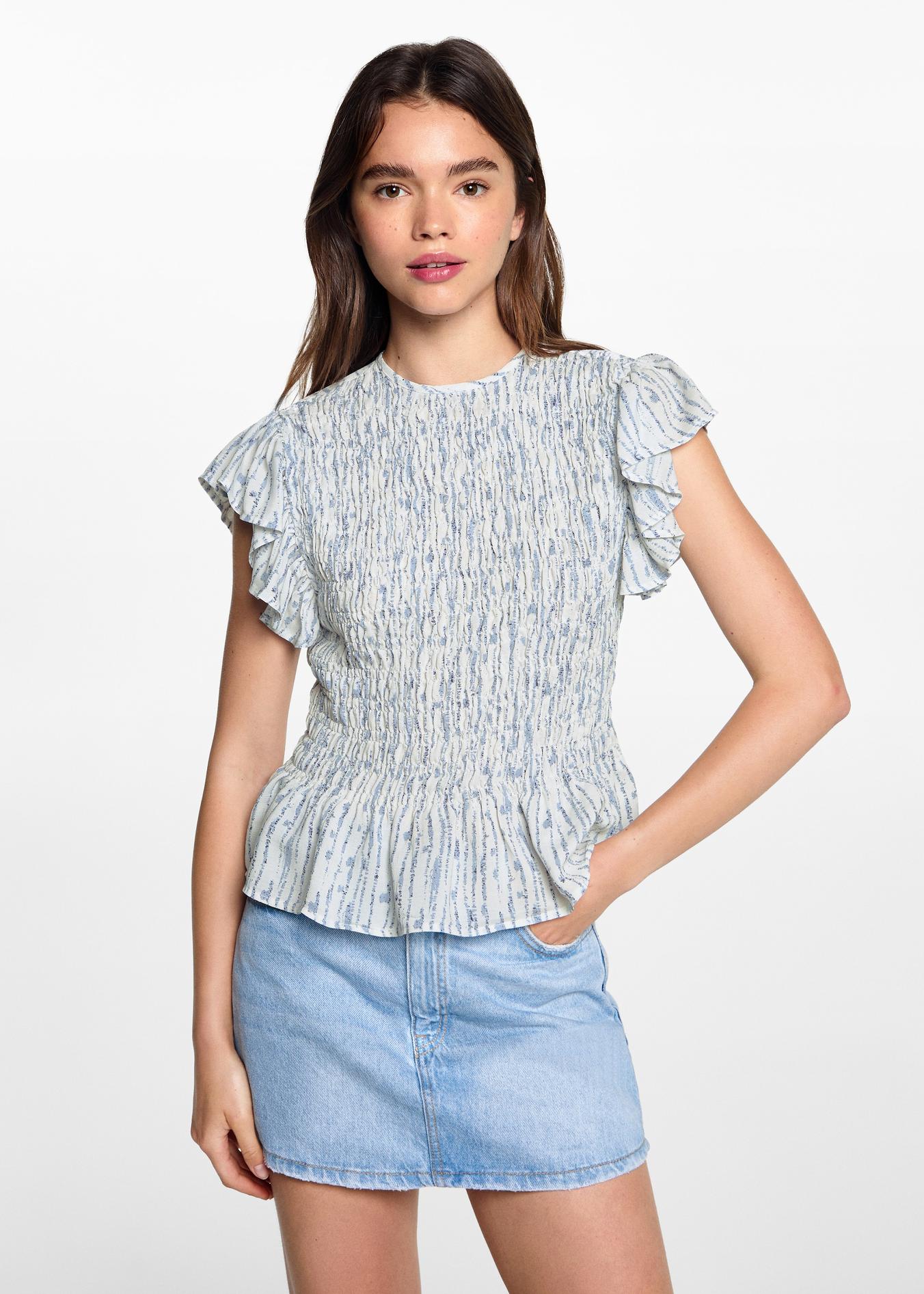 Frilled-sleeve ruched blouse offers at S$ 59.9 in HE by Mango