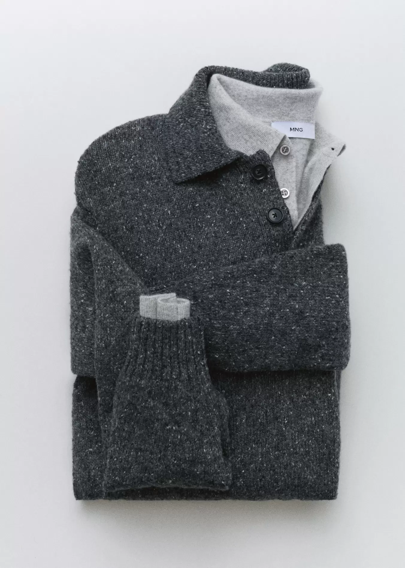 Marbled wool knitted polo shirt offers at S$ 119.9 in HE by Mango