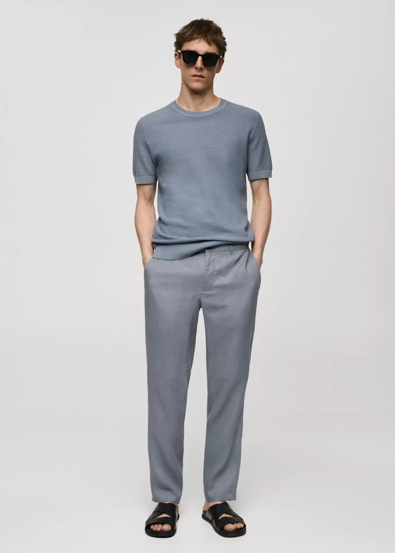 Slim-fit 100% linen trousers offers at S$ 59.9 in HE by Mango