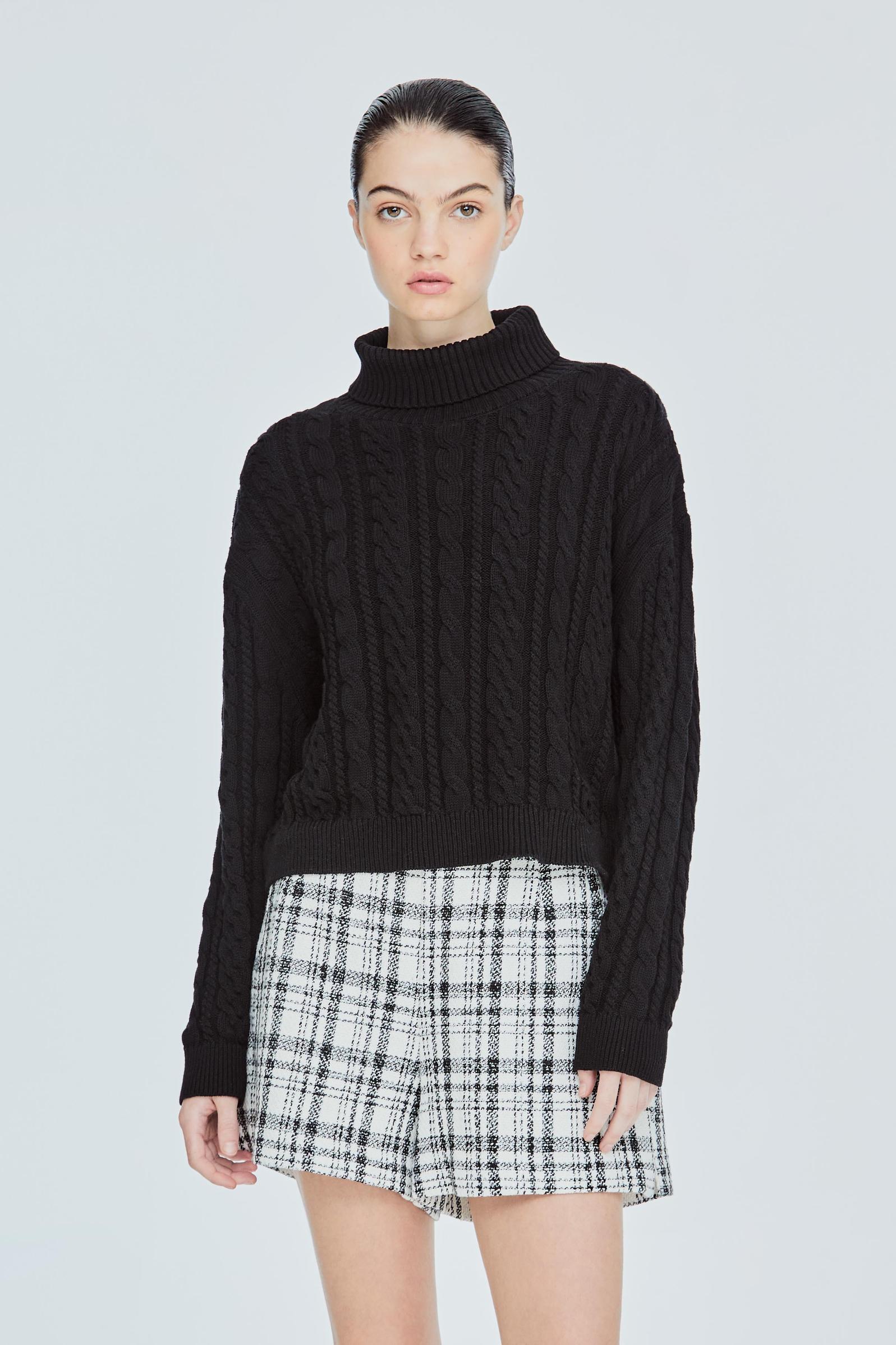 Cable Stitch Knit Top offers at S$ 39.9 in Iora