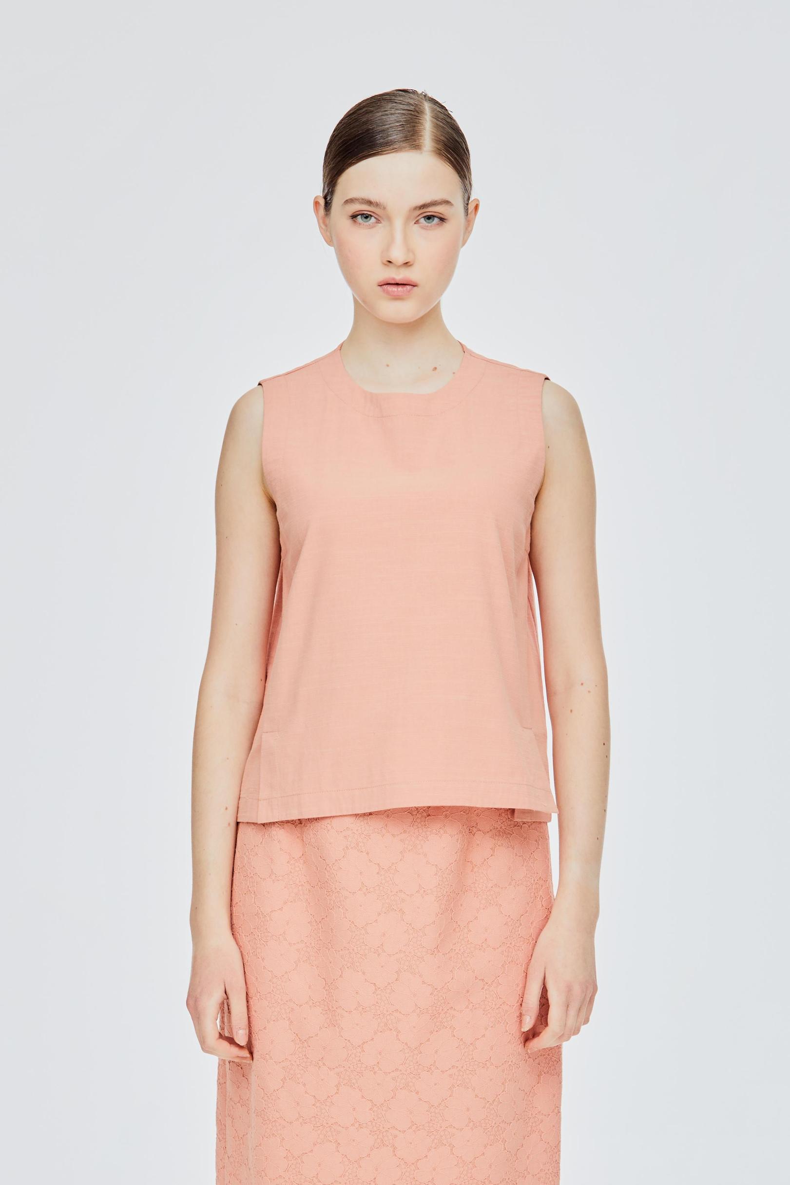 Twin Vent Sleeveless Top offers at S$ 29.9 in Iora
