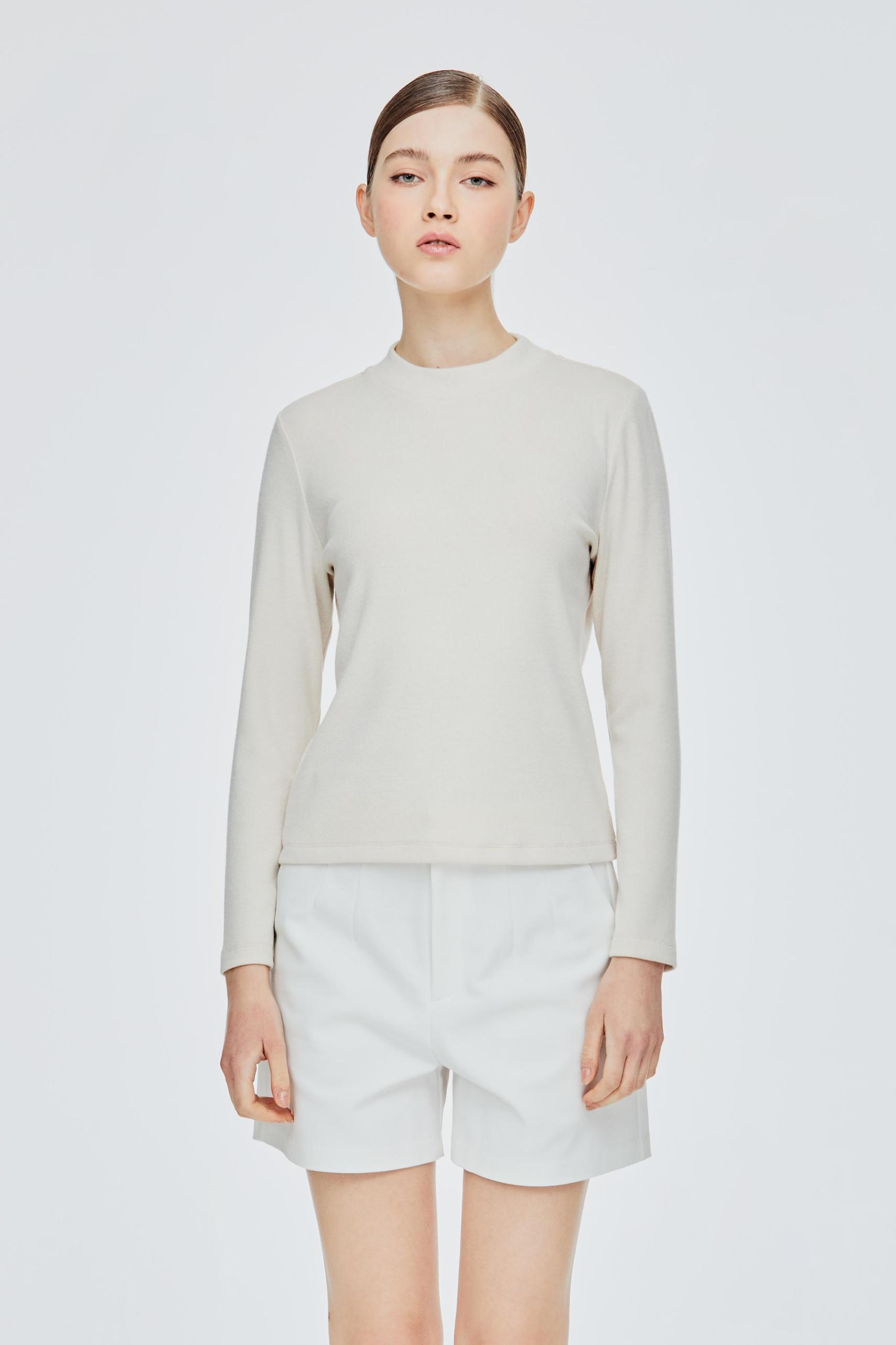 Ribbed Knit Mock Neck Top offers at S$ 19.9 in Iora