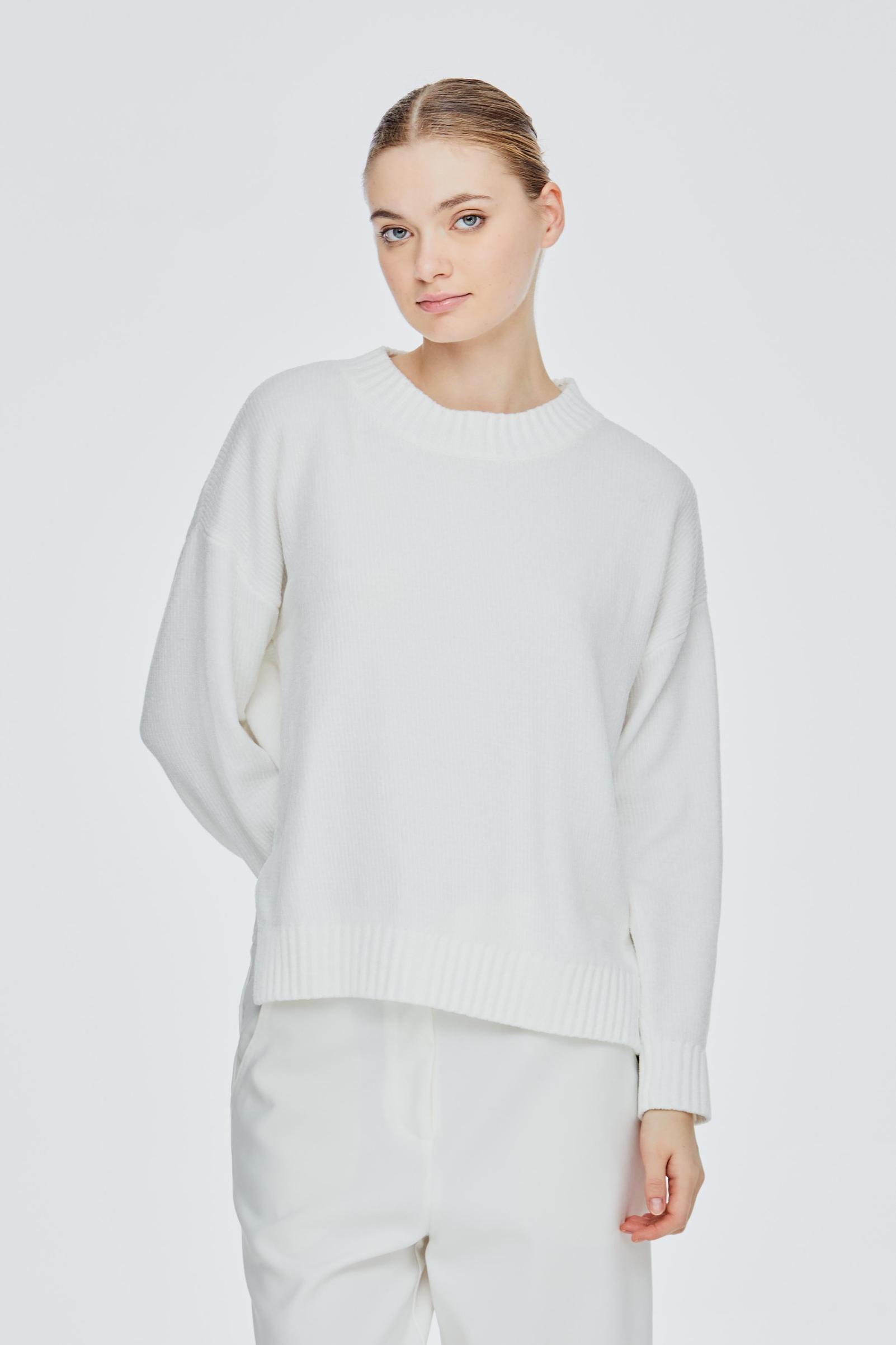 Fluffy High Neck Knit Top offers at S$ 39.9 in Iora
