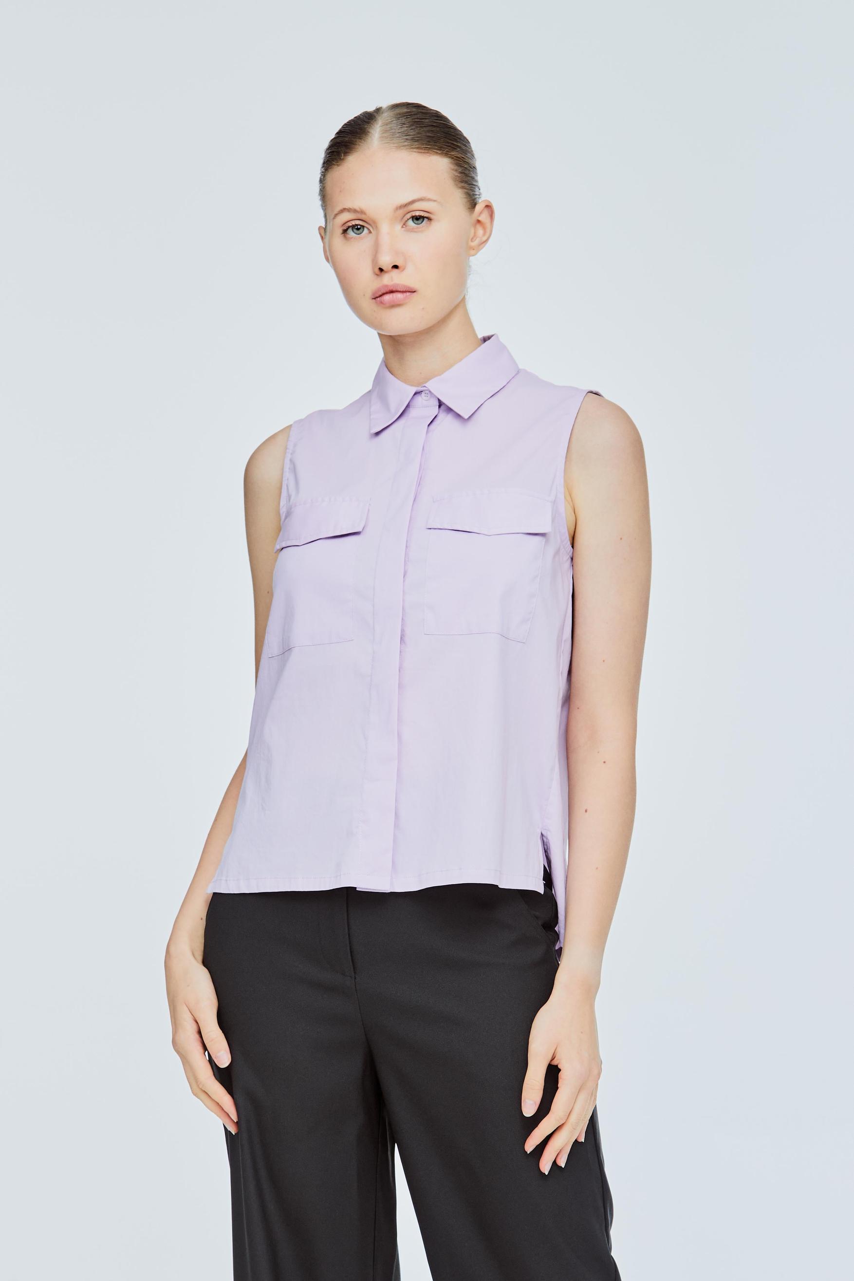Pocket Sleeveless Tank Top offers at S$ 29.9 in Iora