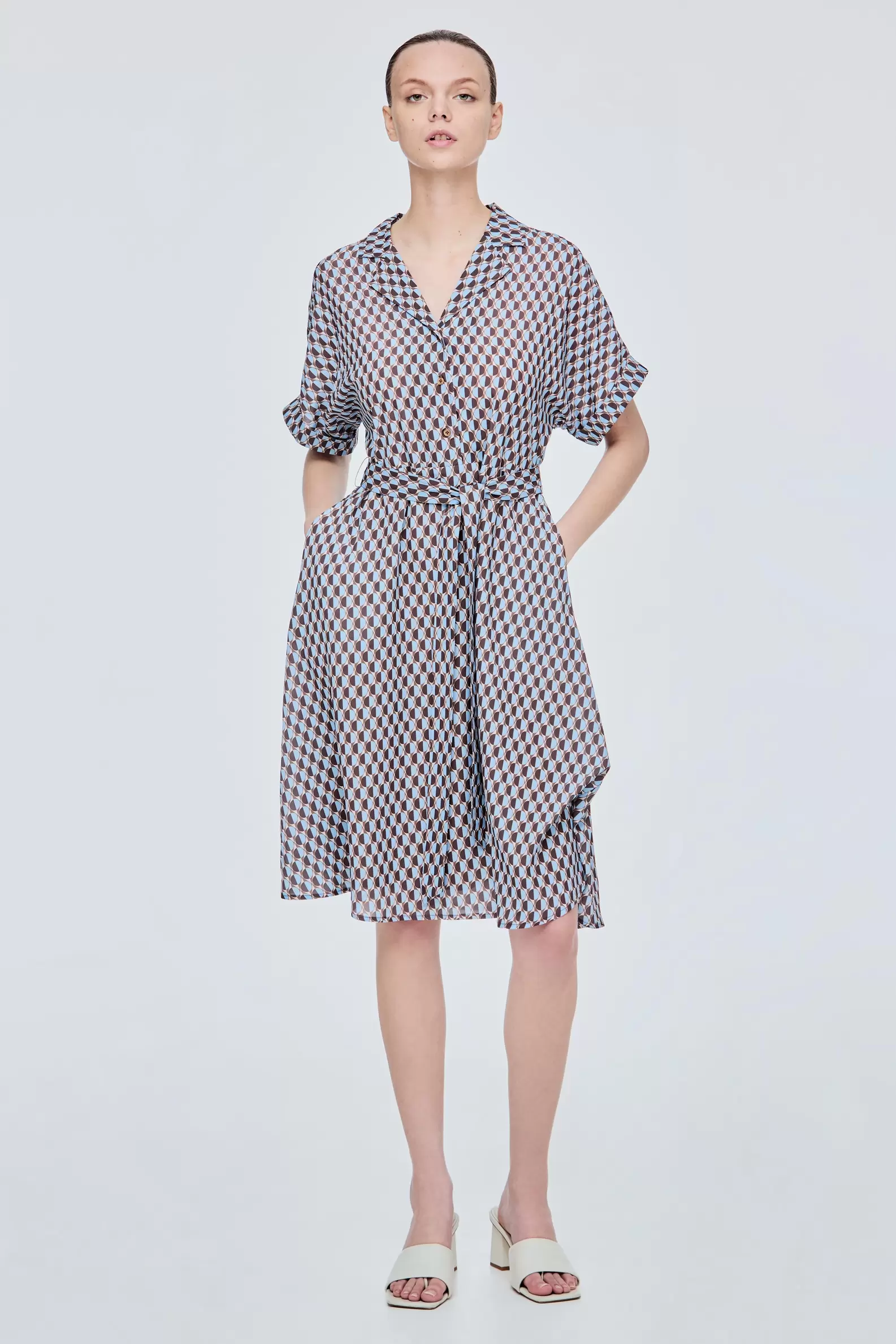 Printed Notched Lapel Dress offers at S$ 49.9 in Iora