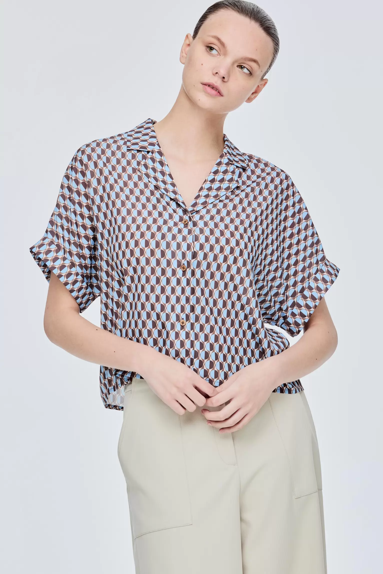 Printed Notched Lapel Shirt offers at S$ 29.9 in Iora