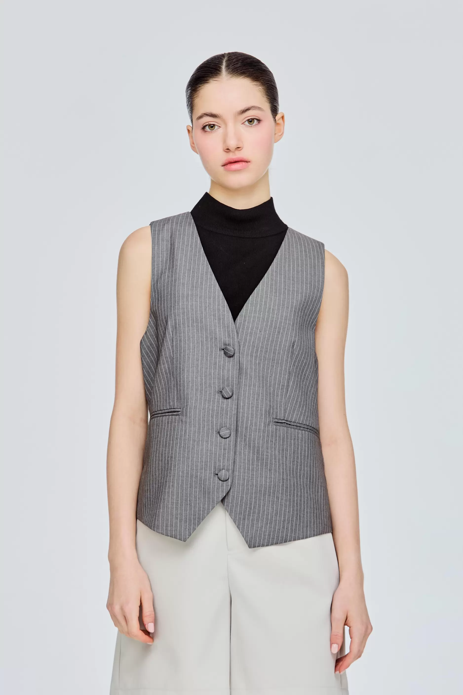 Striped Buttoned Waistcoat offers at S$ 39.9 in Iora