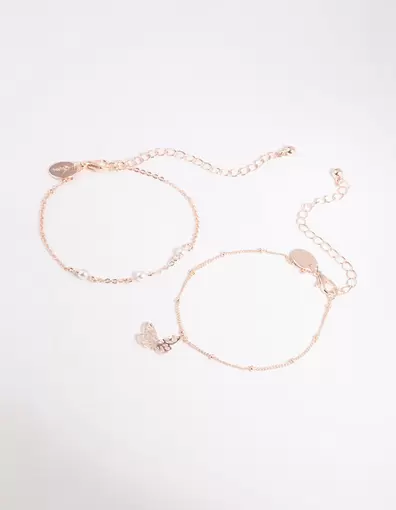 Rose Gold Pearl & Butterfly Bracelet Set offers at S$ 5 in Lovisa