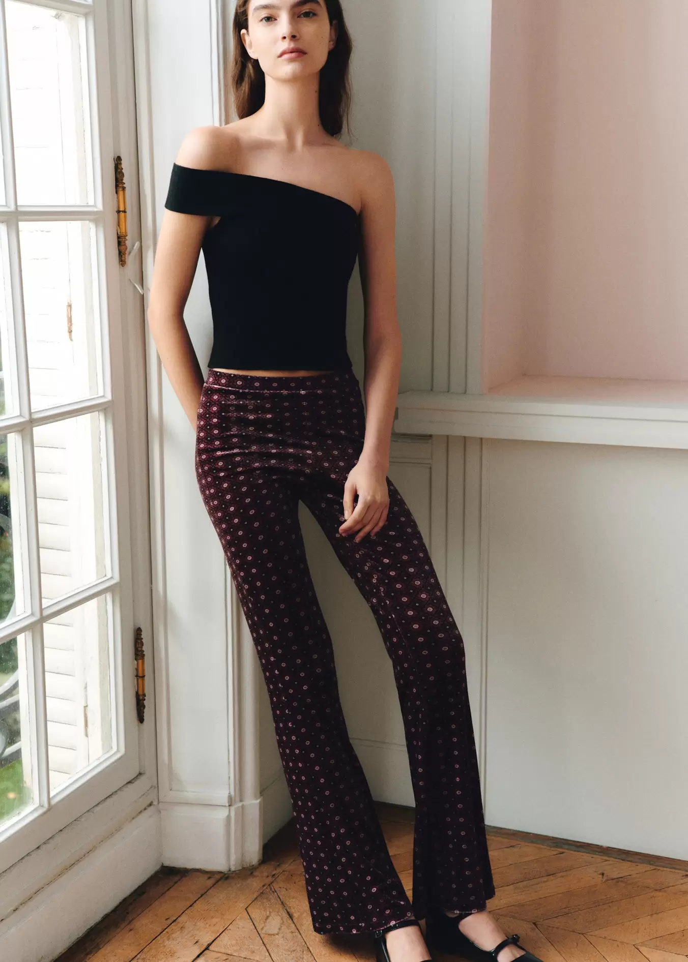 Flared leggings with velvet print offers at S$ 59.9 in Mango