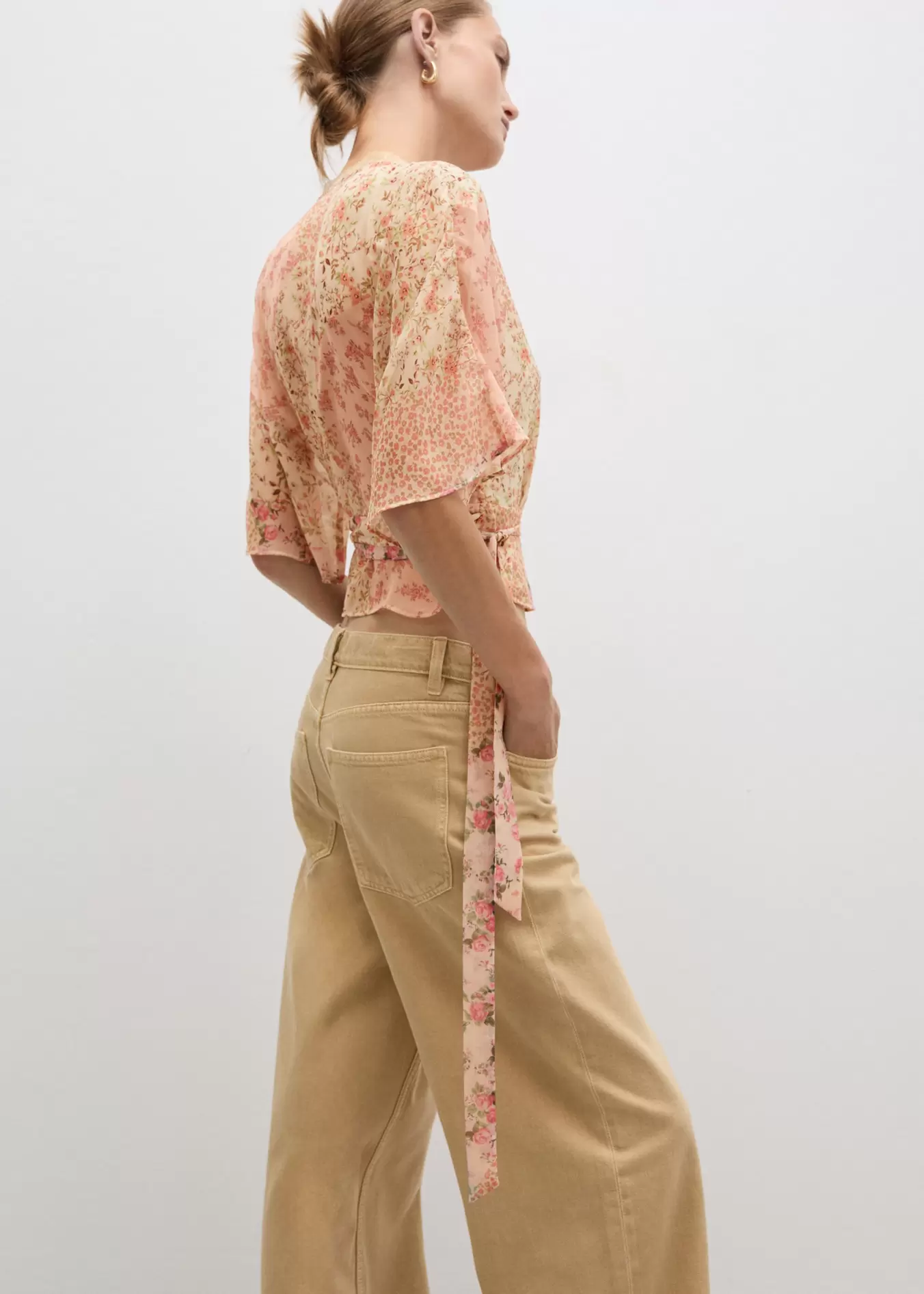 Floral print crossover blouse offers at S$ 29.9 in Mango