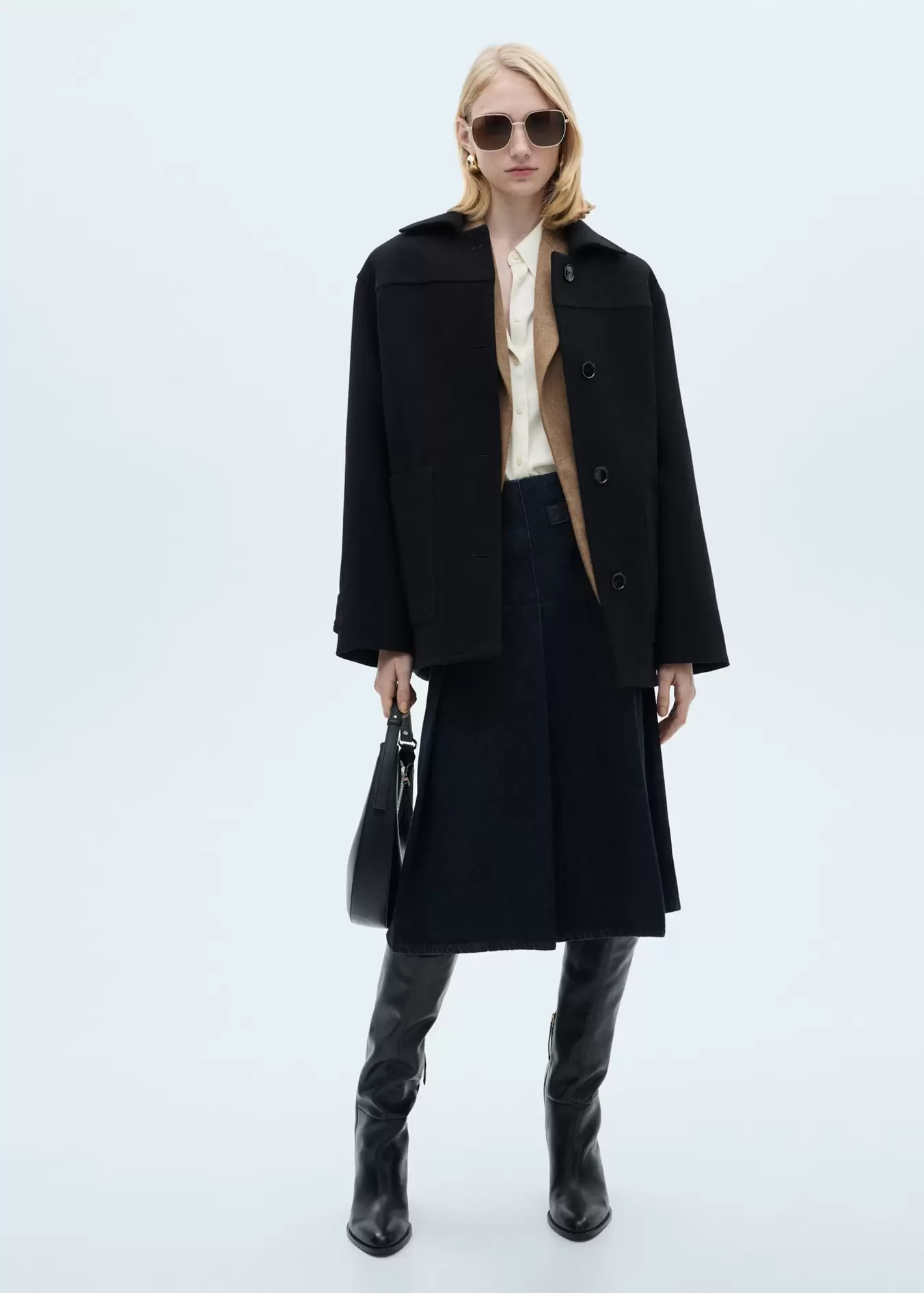 Midi wool coat with buttons offers at S$ 139.9 in Mango