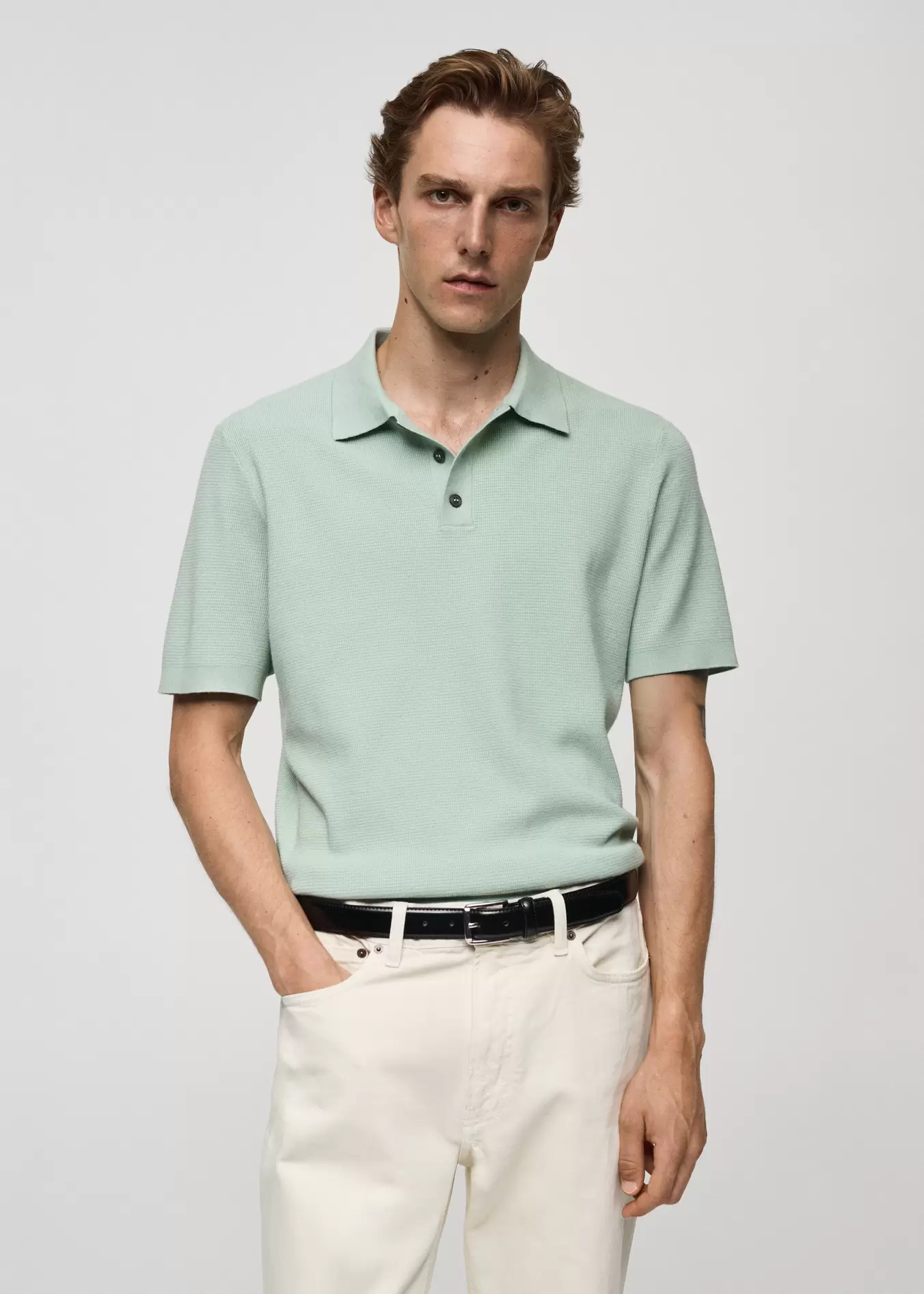 Structured fine-knit polo shirt offers at S$ 69.9 in Mango