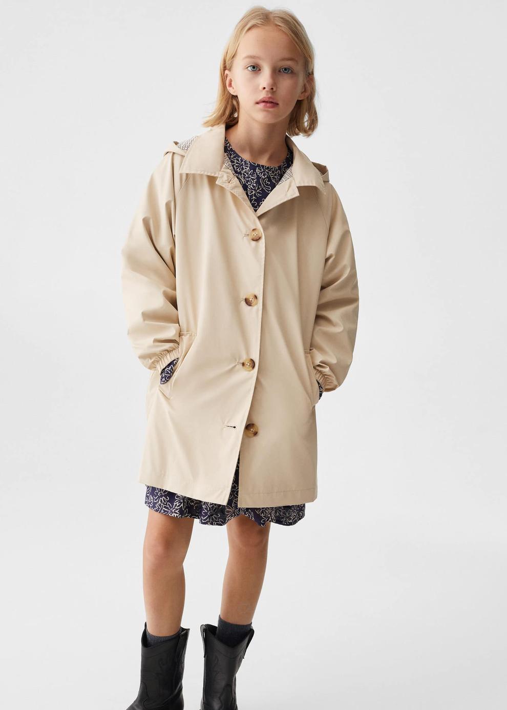 Hooded waterproof trench coat offers at S$ 69.9 in Mango Kids