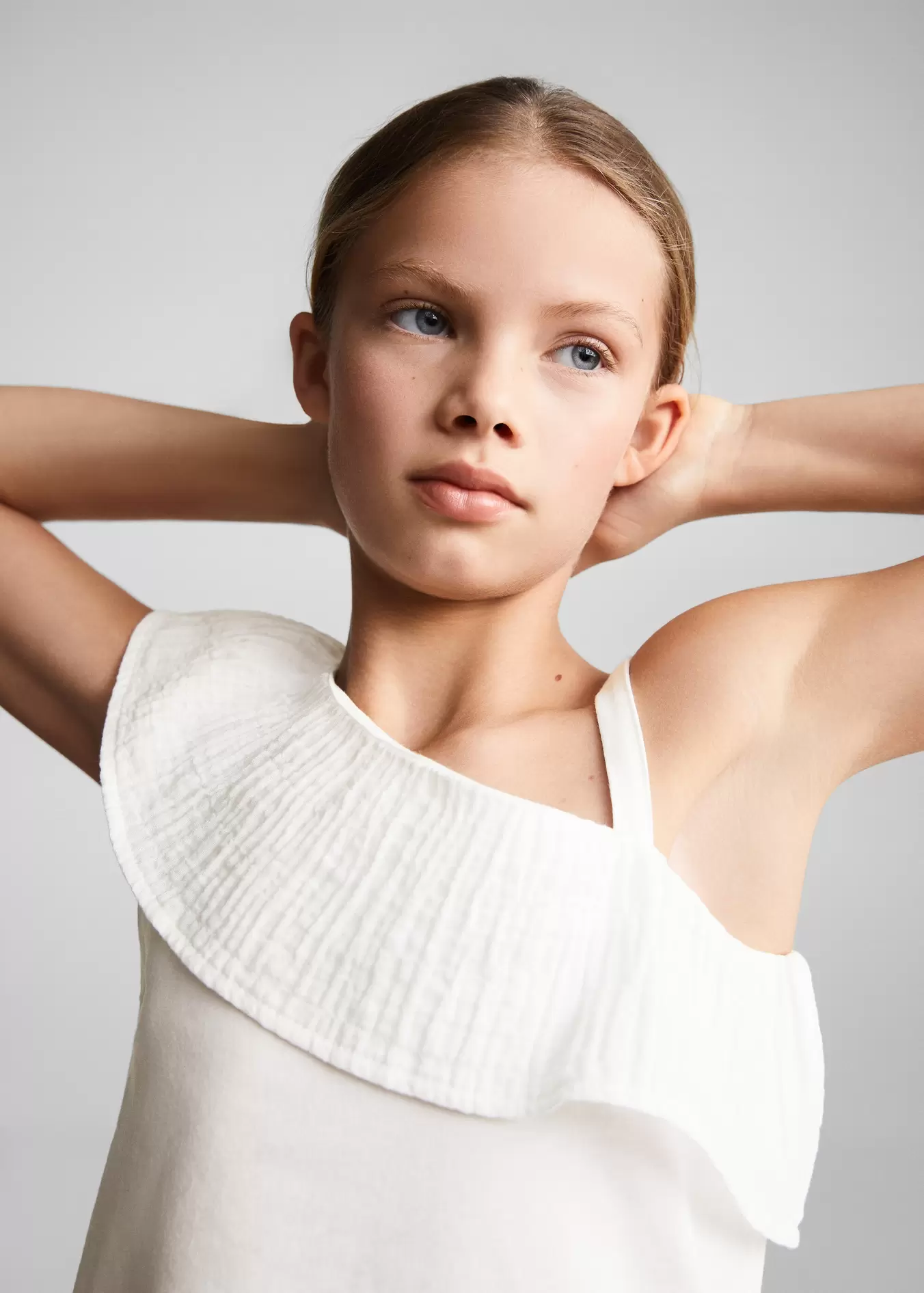 Ruffled asymmetric T-shirt offers at S$ 19.9 in Mango Kids