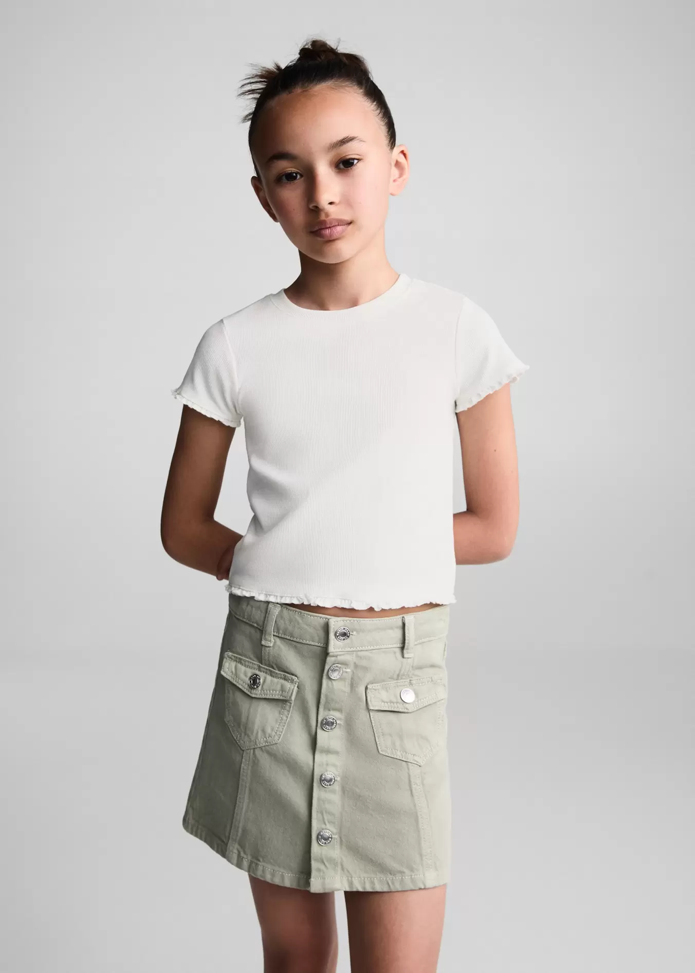 Knitted short-sleeve t-shirt offers at S$ 14.9 in Mango Kids