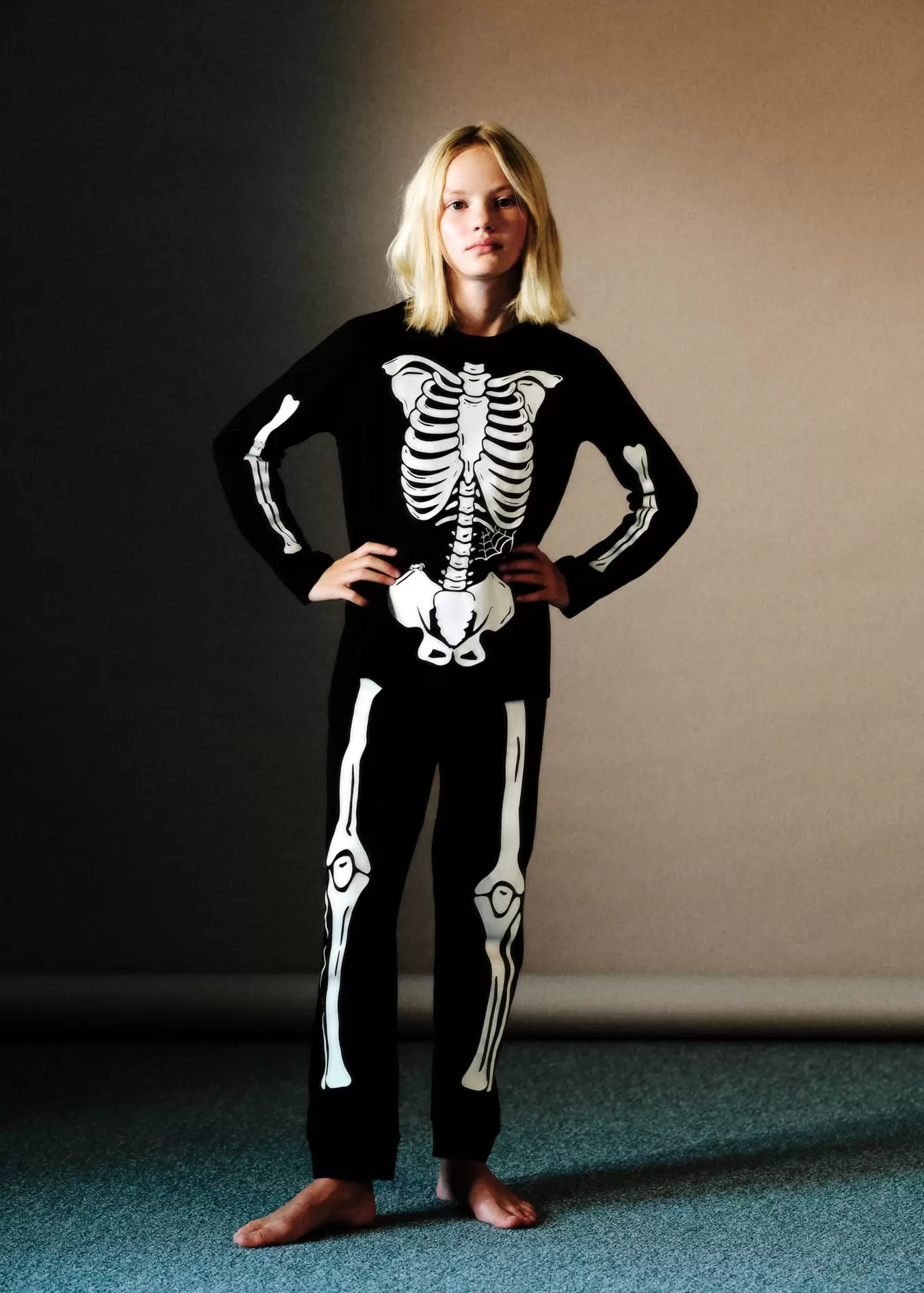 Glow in the dark skeleton pyjama offers at S$ 49.9 in Mango Kids