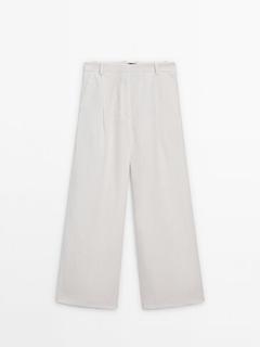 Wide-leg trousers with dart details offers at S$ 199 in Massimo Dutti
