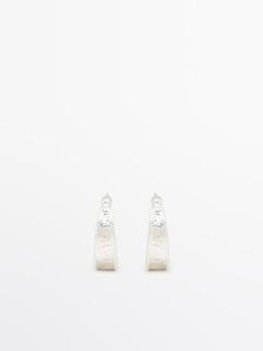 Earrings with textured detail offers at S$ 79 in Massimo Dutti