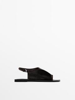 Asymmetric flat sandals - Limited Edition offers at S$ 299 in Massimo Dutti